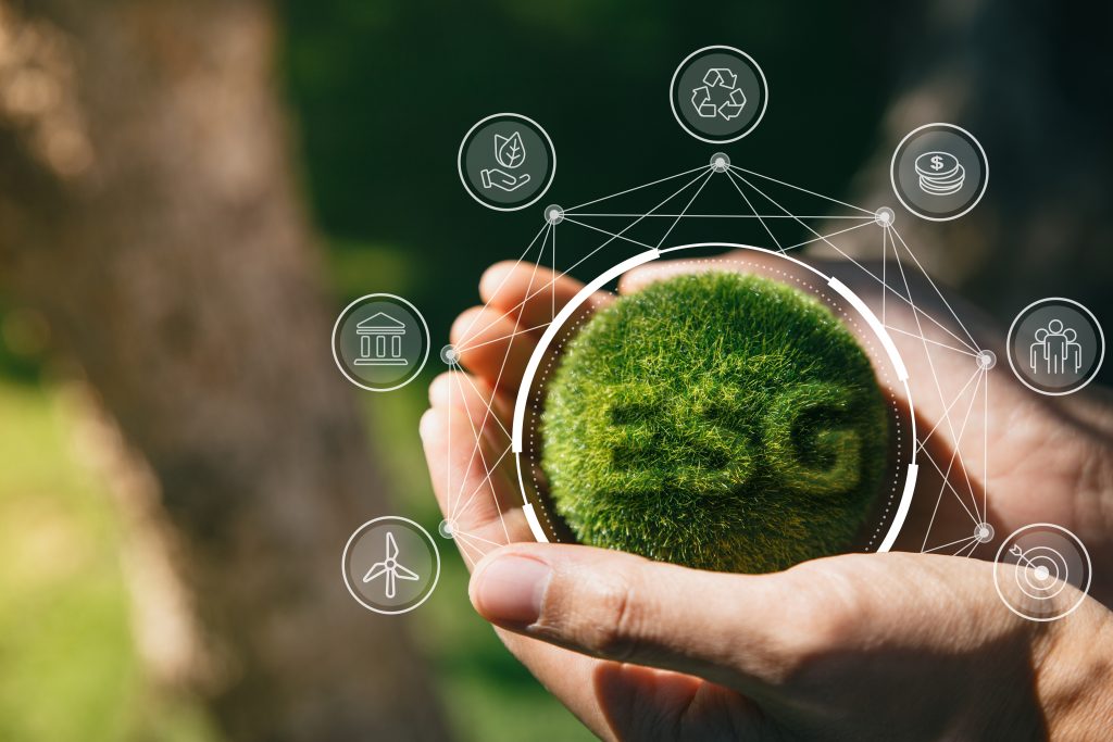 Hand Of Human Holding Green Earth Esg Icon For Environment Socie