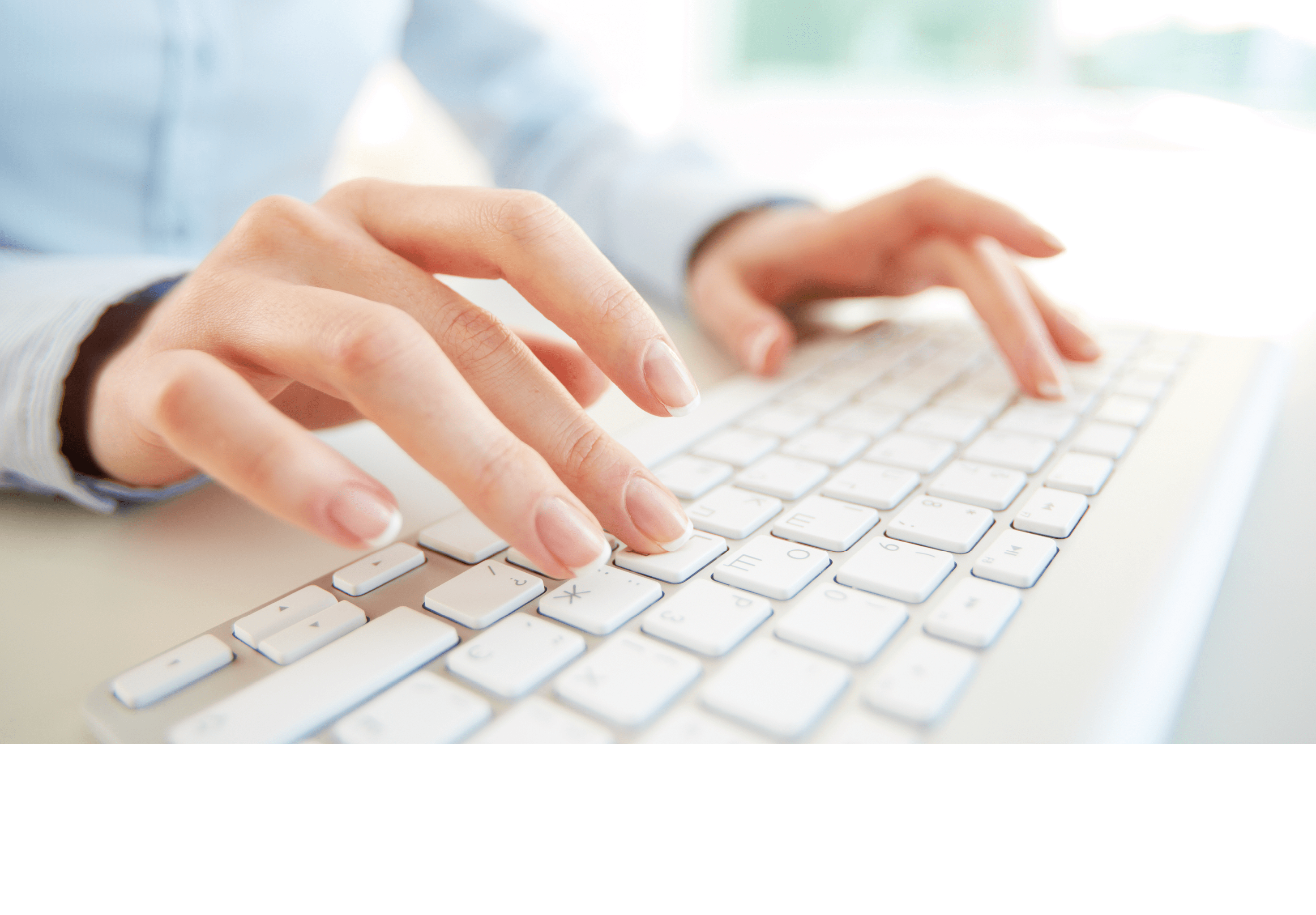 Hands of an office woman typing